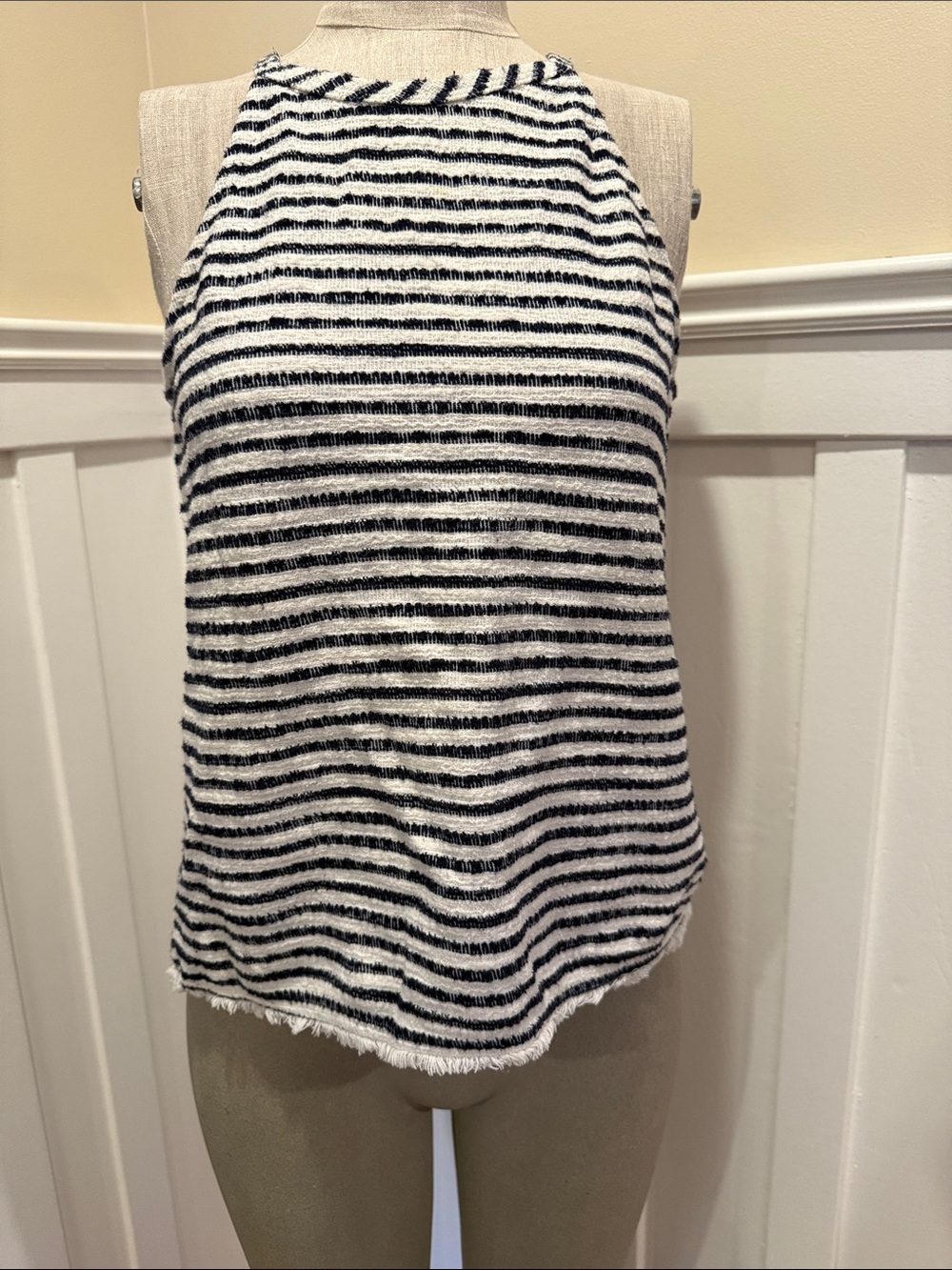 Green Envelope textured black and white striped tank top with a raw fringe hem